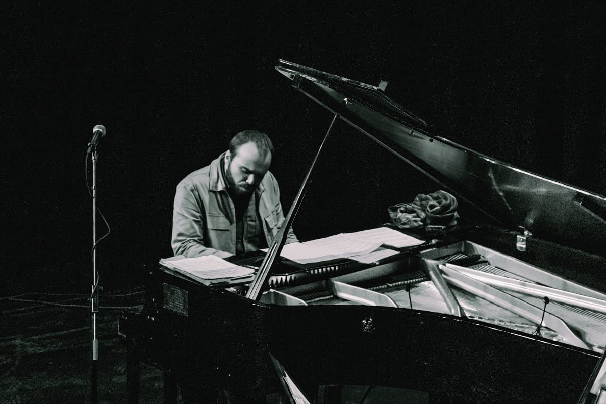 Noah Franche-Nolan playing a grand piano - Photo by Dana Kroeger
