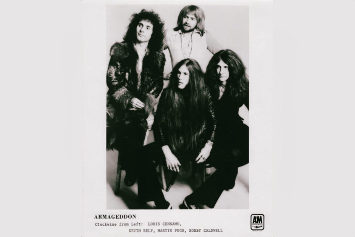 Four members of Armageddon in black and white promotional photo: Louis Cennamo, Keith Relf, Martin Pugh, and Bobby Caldwell.