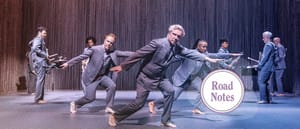 David Byrne performing with his band. Photo by Matthew Murphy.